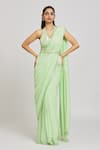 Buy_Nitisha Kashyap Official_Green Silk, Georgette, Organza Sequins, Embroidered Border Saree With Blouse _at_Aza_Fashions