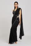 Buy_Nitisha Kashyap Official_Black Silk, Net, Georgette Embroidered Border Pre-draped Saree With Blouse _at_Aza_Fashions