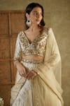 Buy_Mehak Murpana_Ivory Net Embroidered Sequin V-neck Floral Bridal Lehenga Set _Online_at_Aza_Fashions