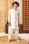 Buy_CUTE COUTURE_White Fancy Weave Silk Woven Banarasi Floral Pattern Sherwani And Pant Set _at_Aza_Fashions