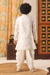 Shop_CUTE COUTURE_White Fancy Weave Silk Woven Banarasi Floral Pattern Sherwani And Pant Set _at_Aza_Fashions