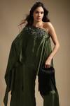 Sakshi Khetterpal_Green Silk Crystals, Cut Work, Sequins, Neckline Embroidered Top And Pant Set _at_Aza_Fashions