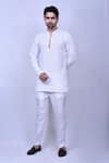 Buy_Arihant Rai Sinha_White Cotton Embroidered Chikankari Floral Short Kurta _at_Aza_Fashions