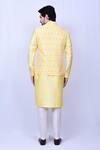 Shop_Arihant Rai Sinha_Yellow Kurta Bangalori Silk Thread Work Bloom Floral Bundi Set _at_Aza_Fashions