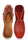 Shop_NR BY NIDHI RATHI_Red Embellished Navratna Stone Juttis _at_Aza_Fashions