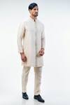 Buy_Kommal Sood_Off White Cotton Silk Embroidered Placket Geometric Kurta With Trouser  _at_Aza_Fashions