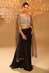 Buy_OMAL SINDWANI_Black Satin Hand Embroidered Sequins Blunt V Neck Blouse And Slit Lehenga Set _at_Aza_Fashions