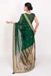 Shop_Monika Mathuria Datta_Emerald Green Raw Silk Embroidered Thread Floral Bud Woven Saree With Blouse _at_Aza_Fashions