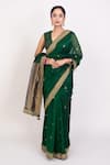 Monika Mathuria Datta_Emerald Green Raw Silk Embroidered Thread Floral Bud Woven Saree With Blouse _Online_at_Aza_Fashions