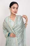 Monika Mathuria Datta_Green Cotton Silk Embroidered Thread V-neck Sequin Floral Saree With Blouse _Online_at_Aza_Fashions