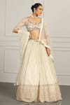 Buy_MeenaGurnam_White Georgette Embroidered Zari Plunged V Sequin And Bead Bridal Lehenga Set _at_Aza_Fashions