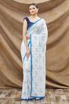 Khwaab by Sanjana Lakhani_Blue Georgette Crochet Lace Border Sequin Saree_Online_at_Aza_Fashions