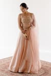 Buy Ridhimaa Gupta Beige Silk Organza, Viscose, Cotton Sequins Sukoon Embroidered Lehenga Set at Aza Fashions Buy_Ridhimaa Gupta_Beige Silk Organza, Viscose, Cotton Sequins Sukoon Embroidered Lehenga Set _at_Aza_Fashions