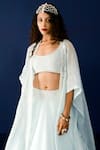 Ridhimaa Gupta_Blue Viscose Raw Silk Embroidery Resham Blouse Zaara Work Cape And Lehenga Set _Online_at_Aza_Fashions