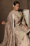 tara thakur_Beige Silk Embroidered Floral Round Kurta Sharara Set _at_Aza_Fashions