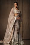 tara thakur_Beige Butterfly Net Hand Embroidered Floral Pre-draped Saree With Blouse _at_Aza_Fashions