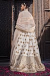 Shop_tara thakur_Ivory Silk Embroidered Floral Deep V Neck Lehenga Set  _at_Aza_Fashions