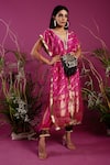 tara thakur_Fuchsia Brocade Embroidered Conch Shell Zari Floral Knot Top With Cuff Pant _Online_at_Aza_Fashions