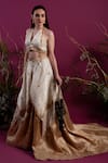 tara thakur_Ivory Organza Embroidered Floral Halter Zari Layered Lehenga With Top _Online_at_Aza_Fashions