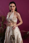 Buy_tara thakur_Ivory Organza Embroidered Floral Halter Zari Layered Lehenga With Top _Online_at_Aza_Fashions