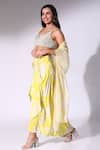 Shop_Sakshi Girri_Yellow Crepe Printed Floral Leaf Draped Skirt Cape Set _Online_at_Aza_Fashions