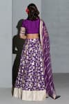 Shop_Rishi and Vibhuti_Purple Net And Raw Silk Embellished Sequins Deep V Neck Floral Lehenga Set _at_Aza_Fashions