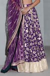 Rishi and Vibhuti_Purple Net And Raw Silk Embellished Sequins Deep V Neck Floral Lehenga Set _Online_at_Aza_Fashions