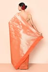 Shop_Nazaakat by Samara Singh_Orange Saree Banarasi Silk Woven Floral Zari With Running Blouse Piece_at_Aza_Fashions