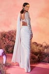 Shop_PARUL GANDHI_White Texture Lycra Sitaara Pleated Embellished Pre-draped Saree With Blouse _at_Aza_Fashions