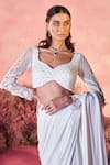 Shop_PARUL GANDHI_White Texture Lycra Sitaara Pleated Embellished Pre-draped Saree With Blouse _Online_at_Aza_Fashions