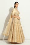Shop_Vandana Sethi_Gold Silk Sequins, Crystals, Tassels Embroidered Floral Bridal Lehenga Set _at_Aza_Fashions