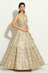 Shop_Vandana Sethi_Ivory Silk, Chiffon Crystals, Mirrorwork Floral Jaal Embellished Lehenga Set _at_Aza_Fashions