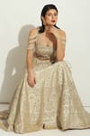 Shop_Vandana Sethi_Ivory Silk Crystals, Mirrors Square Neck Floral Jaal Embellished Lehenga Set _at_Aza_Fashions