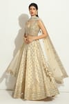 Buy_Vandana Sethi_Ivory Raw Silk Embroidered Mirrorwork V-neck Scalloped Pattern Lehenga Set _Online_at_Aza_Fashions