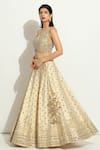 Shop_Vandana Sethi_Ivory Raw Silk Embroidered Mirrorwork V-neck Scalloped Pattern Lehenga Set _Online_at_Aza_Fashions