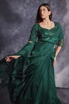 Shop_Varun Chakkilam_Green Silk Organza Embroidered Ruffle Lehenga Saree With Blouse  _Online_at_Aza_Fashions