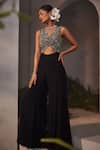 Buy_Charu and Vasundhara_Black Silk Embroidered Bead And Cut Dana Work V Neck Lara Yoke Jumpsuit _at_Aza_Fashions