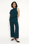 House of Behram_Green Moss Crepe Plain High Neck Asymmetric Sleeve Jumpsuit _Online_at_Aza_Fashions