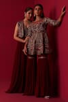 Adaara Couture_Maroon Top Russian Silk Embroidery Sequin Boat Neck Glitch Peplum Sharara Set _Online_at_Aza_Fashions