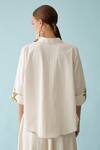 Shop_Nikasha_Cream Poplin Embroidery Collared Banana Tree Applique Top _at_Aza_Fashions
