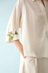 Buy_Nikasha_Cream Poplin Embroidery Collared Banana Tree Applique Top _Online_at_Aza_Fashions
