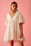 Buy_Nikasha_Cream Jamdani Cotton And Poplin Embroidered Banana Solid Bubble Sleeve Tier Dress _at_Aza_Fashions