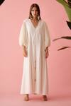 Buy Nikasha Cream Muslin V-neck Handwoven Bubble Sleeve A-line Dress at Aza Fashions Buy_Nikasha_Cream Muslin V-neck Handwoven Bubble Sleeve A-line Dress _at_Aza_Fashions