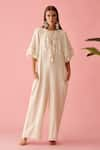 Buy_Nikasha_Cream Double Cloth Fabric And Cotton Applique Banana Tree Fringe Neckline Jumpsuit _at_Aza_Fashions