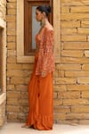 Shop_Arpita Mehta_Orange Jacket And Blouse Net Hand Embroidered Mirror Work Draped Skirt Set _Online_at_Aza_Fashions