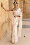 Buy_Arpita Mehta_Ivory Georgette Hand Embroidered Mirror Sequin Pre-draped Saree With Blouse_at_Aza_Fashions