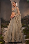 Charu and Vasundhara_Silver Net Hand Embroidered Stone Leaf Neck Lily Bead Bridal Lehenga Set _Online_at_Aza_Fashions