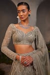 Buy_Charu and Vasundhara_Silver Net Hand Embroidered Sequin Leaf Neck Lilian Bridal Lehenga Set _Online_at_Aza_Fashions