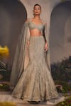 Buy_Charu and Vasundhara_Silver Net Hand Embroidered Pearl Sweetheart Neck Leah Lehenga And Blouse Set _at_Aza_Fashions