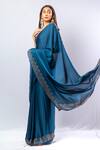 Shop Sayisha Blue Shantoon Crystals Florin Border Saree With Unstitched Blouse Piece Online at Aza Fashions Shop_Sayisha_Blue Shantoon Crystals Florin Border Saree With Unstitched Blouse Piece_Online_at_Aza_Fashions